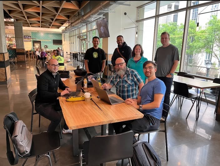 Tech Affiliates meetup with laptops open